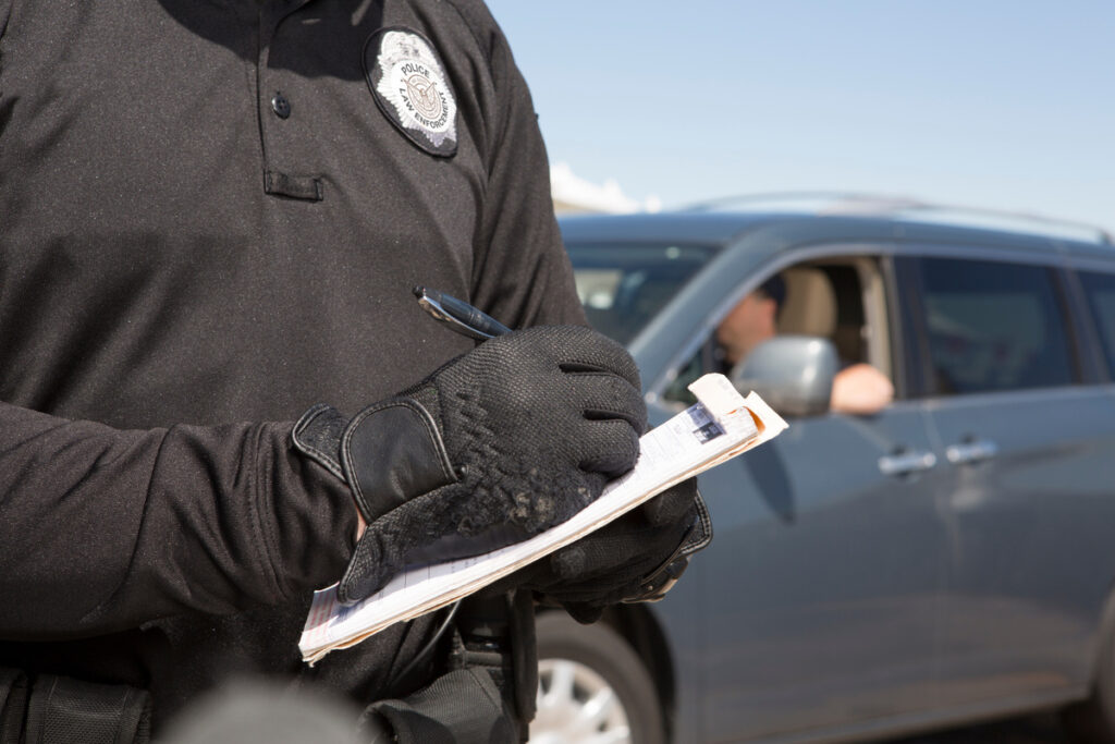 Airport Bike Police issuing citation at airport terminal