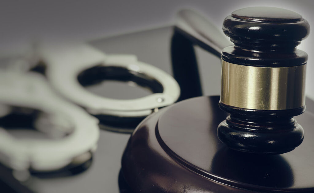 Legal law concept image - gavel and handcuffs